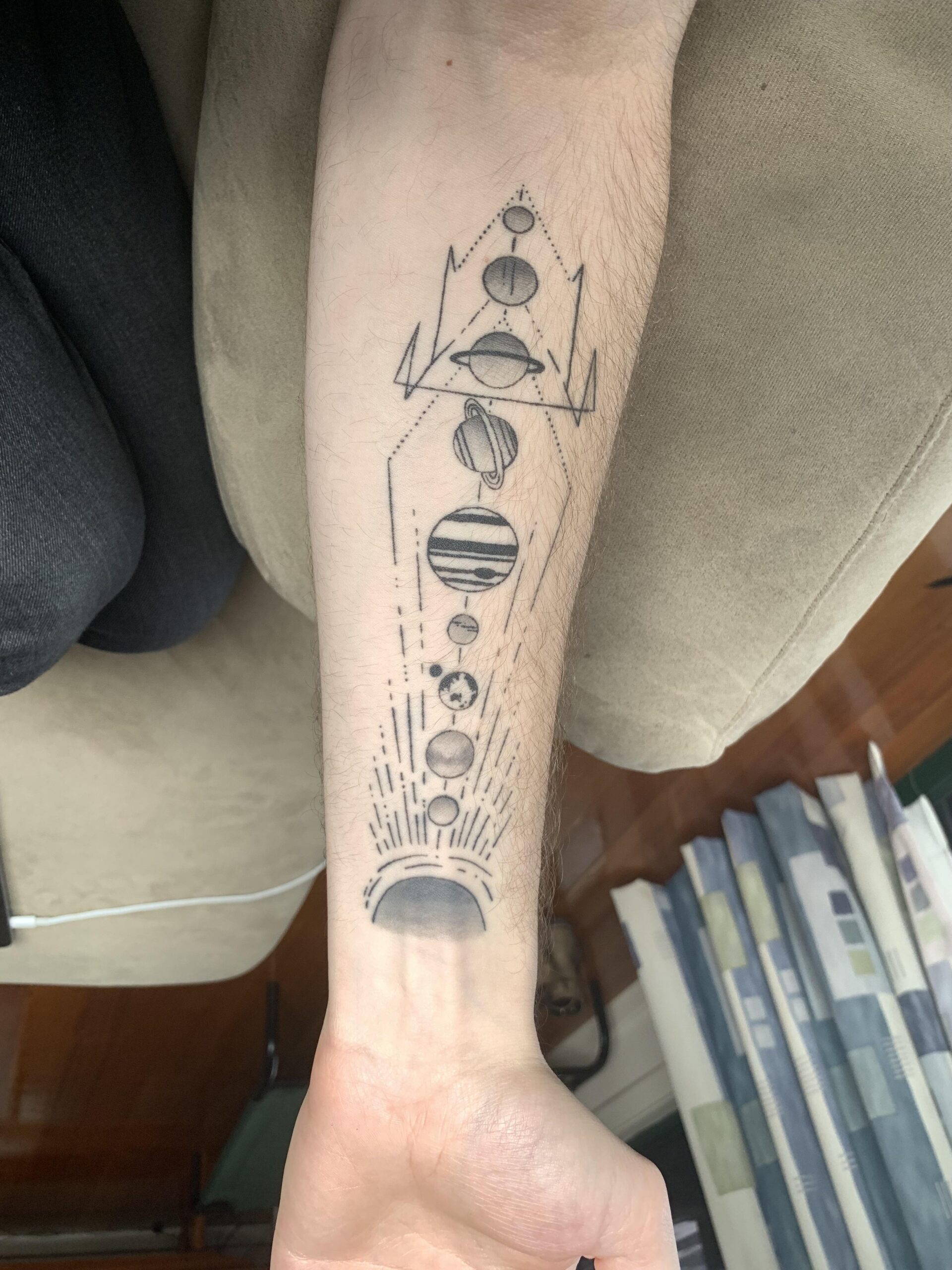 Intricate Solar System Balance Tattoo