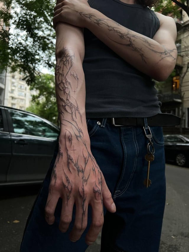 Intricate Fine-Line Neo-Tribal Arm Sleeve