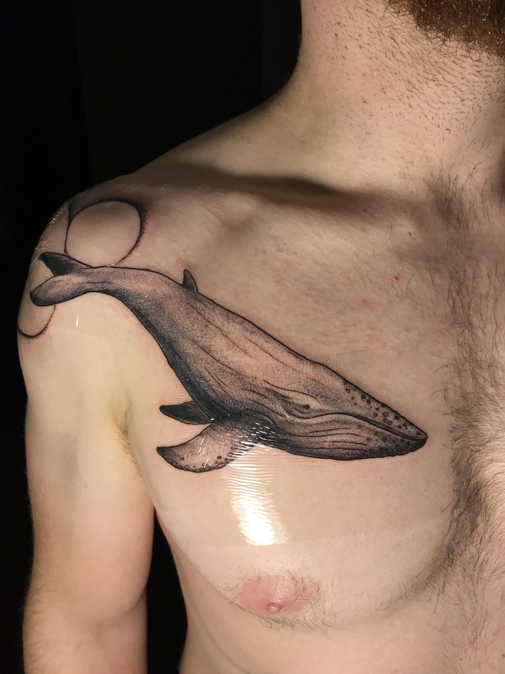 Bold Whale Chest Tattoo Placement
