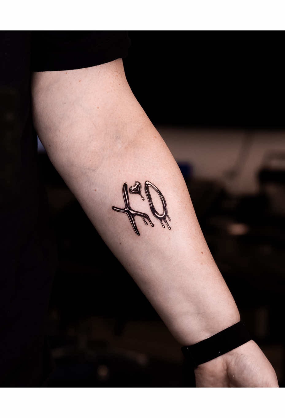 Bold Drip Style XO Arm Tattoo
