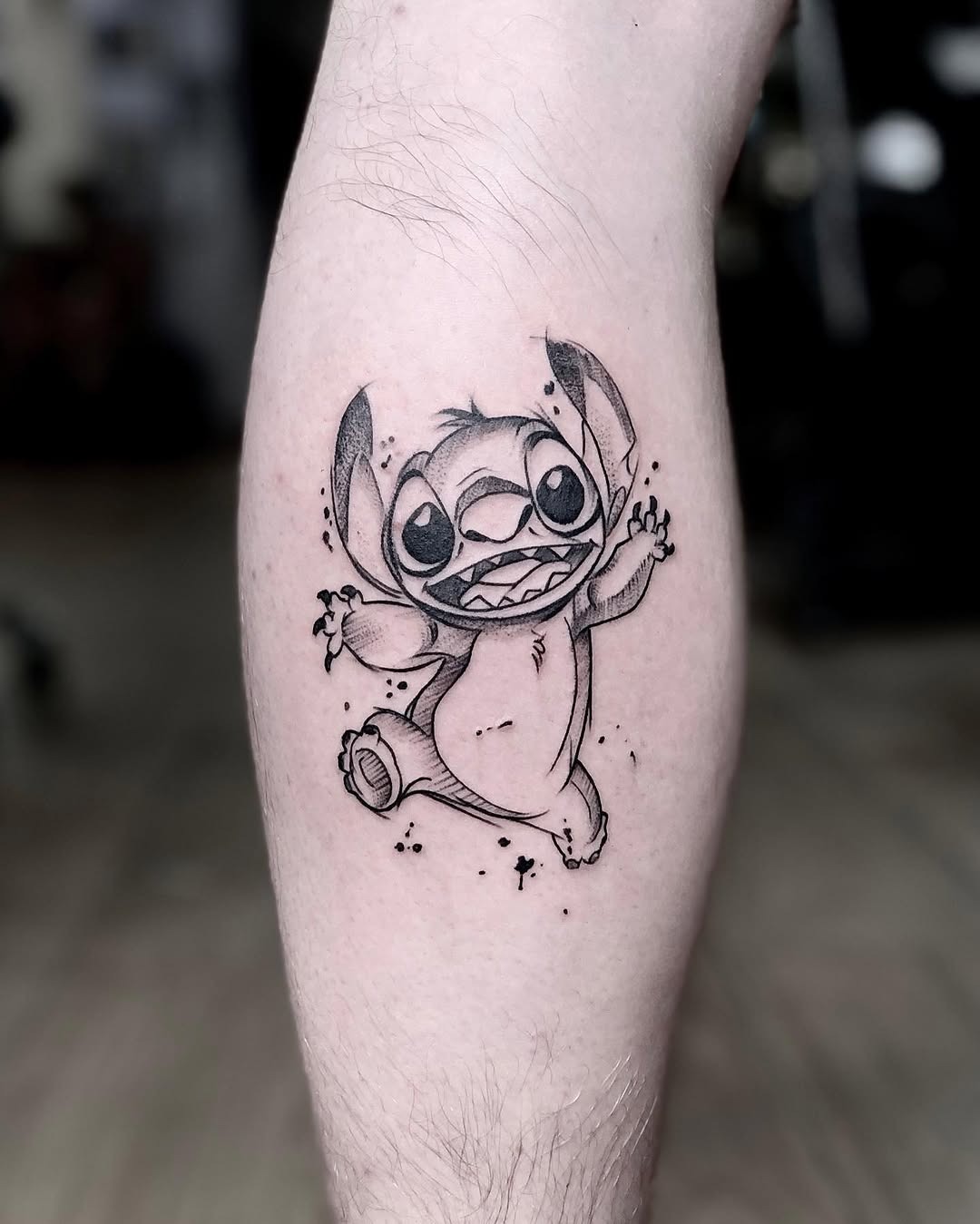 Minimalist Stitch fine-line tattoo