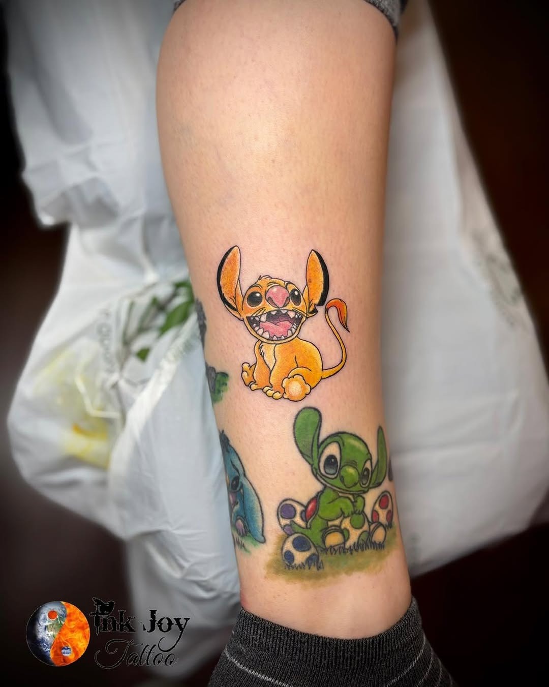 Cute and colorful Stitch character tattoo