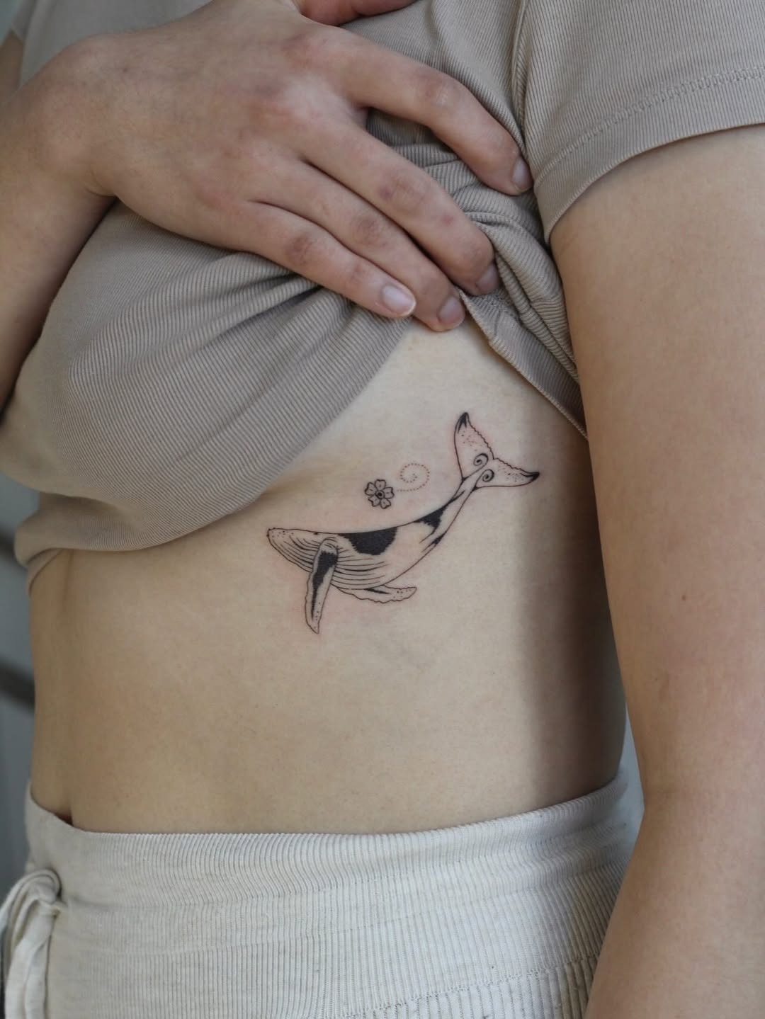 Minimalist Whale Ribcage Tattoo