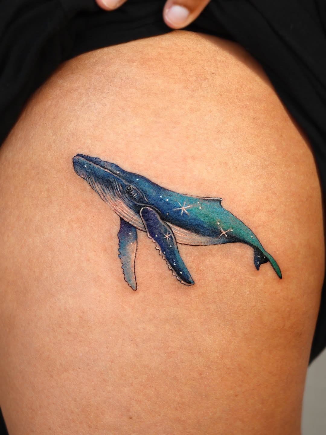 Vibrant Cosmic Whale Tattoo