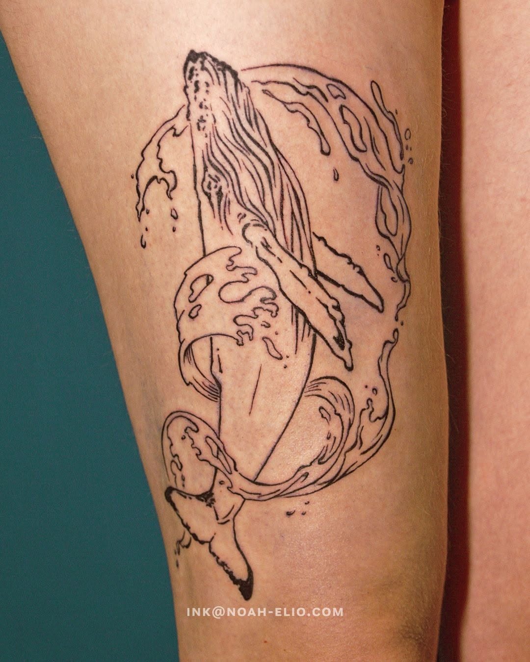 Elegant Minimalist Whale Tattoo