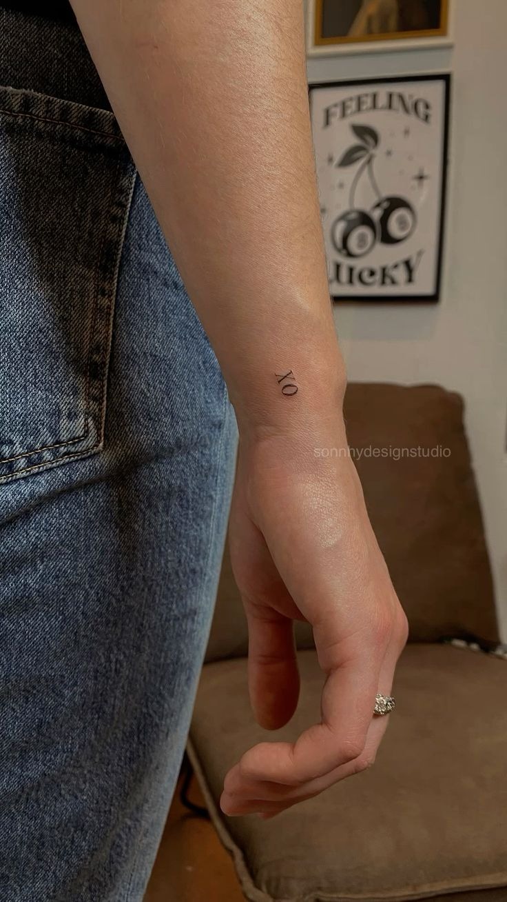 Minimalist Wrist XO Tattoo