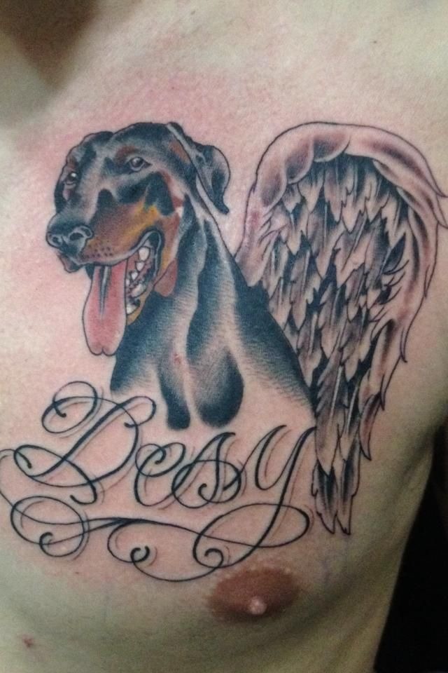Meaningful Doberman memorial tattoo design