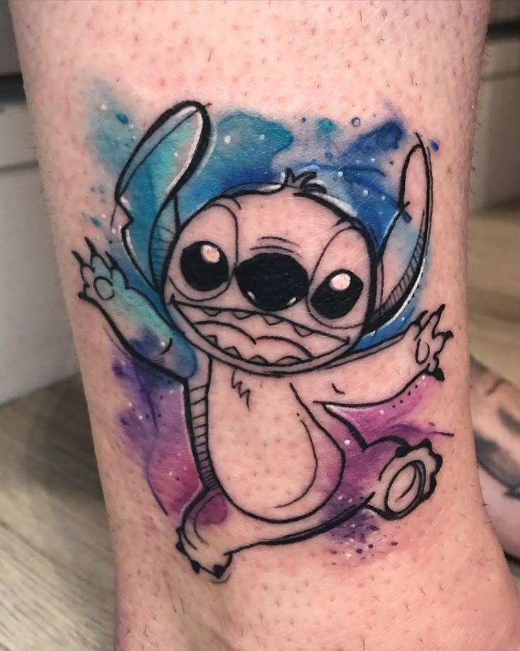 Vibrant Watercolor Stitch Tattoo
