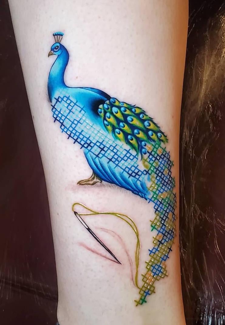 Intricate Cross-Stitch Peacock Design