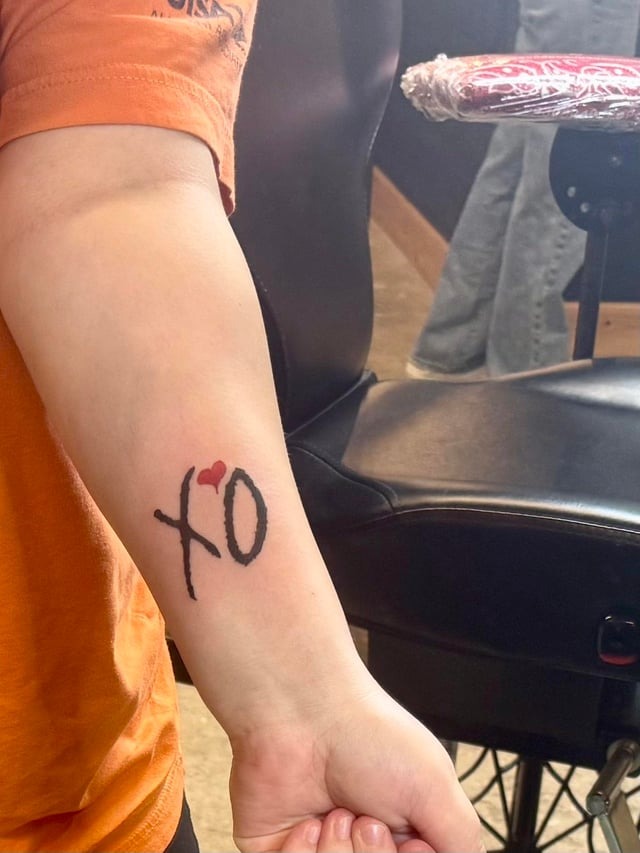 Minimalist XO Tattoo with Heart Detail