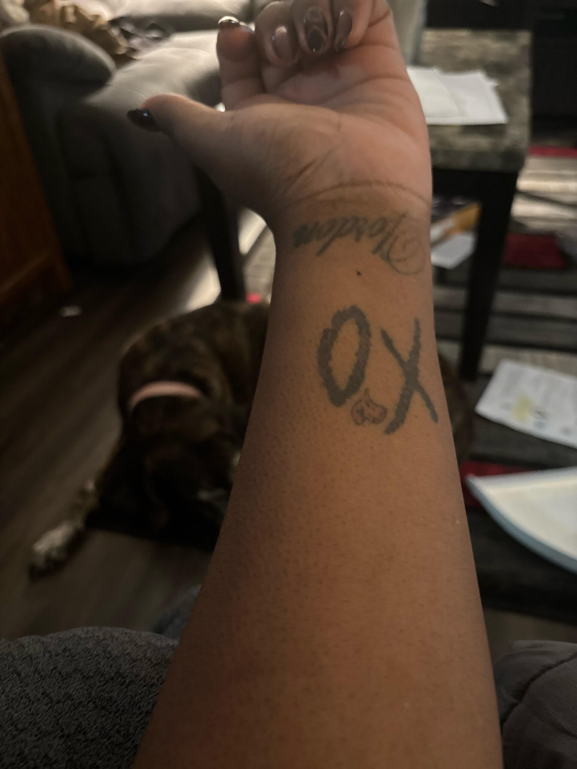 Dainty Wrist XO Emblem