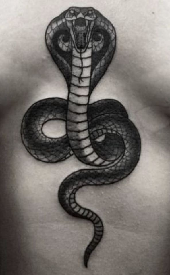 Classic Blackwork Cobra Tattoo