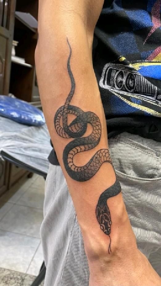 Minimalist Forearm Snake Tattoo
