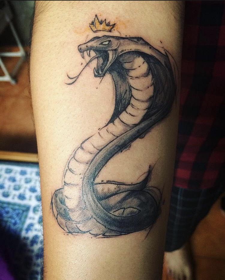 Dramatic Crowned King Cobra Tattoo