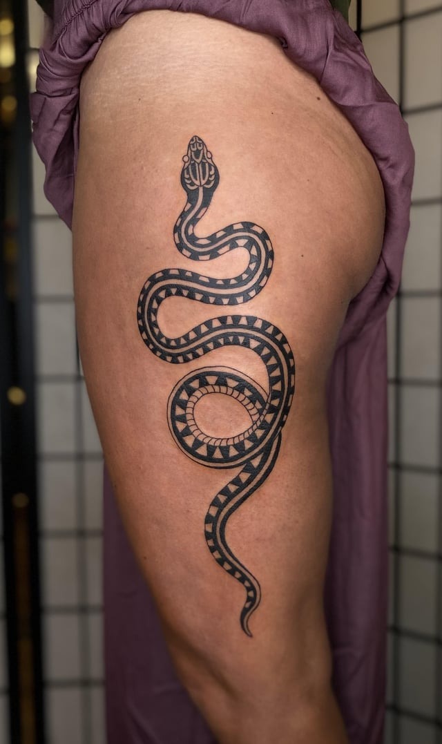 Elegant Minimalist Serpent Leg Tattoo