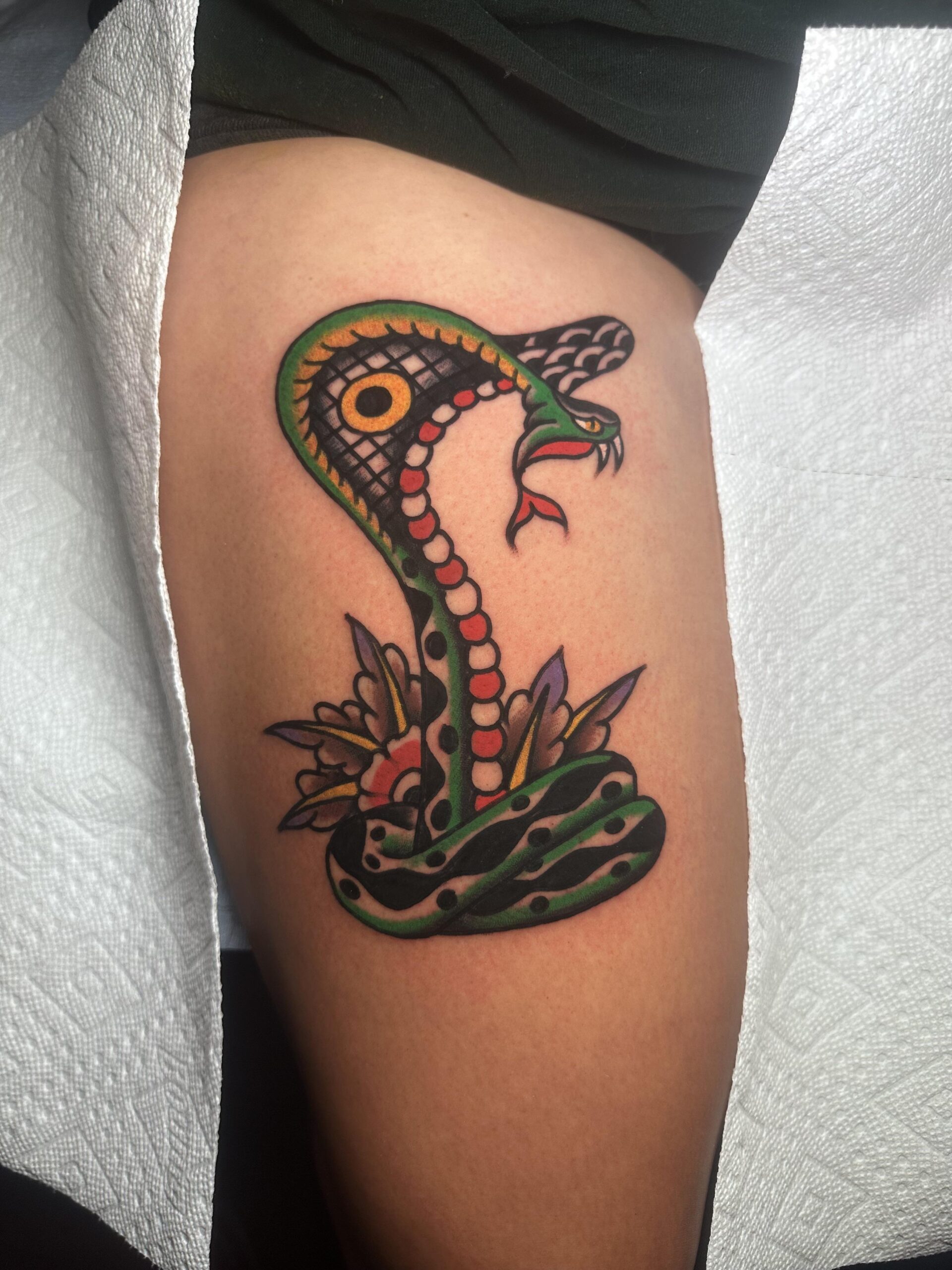 Vibrant Neo-Traditional Cobra Tattoo