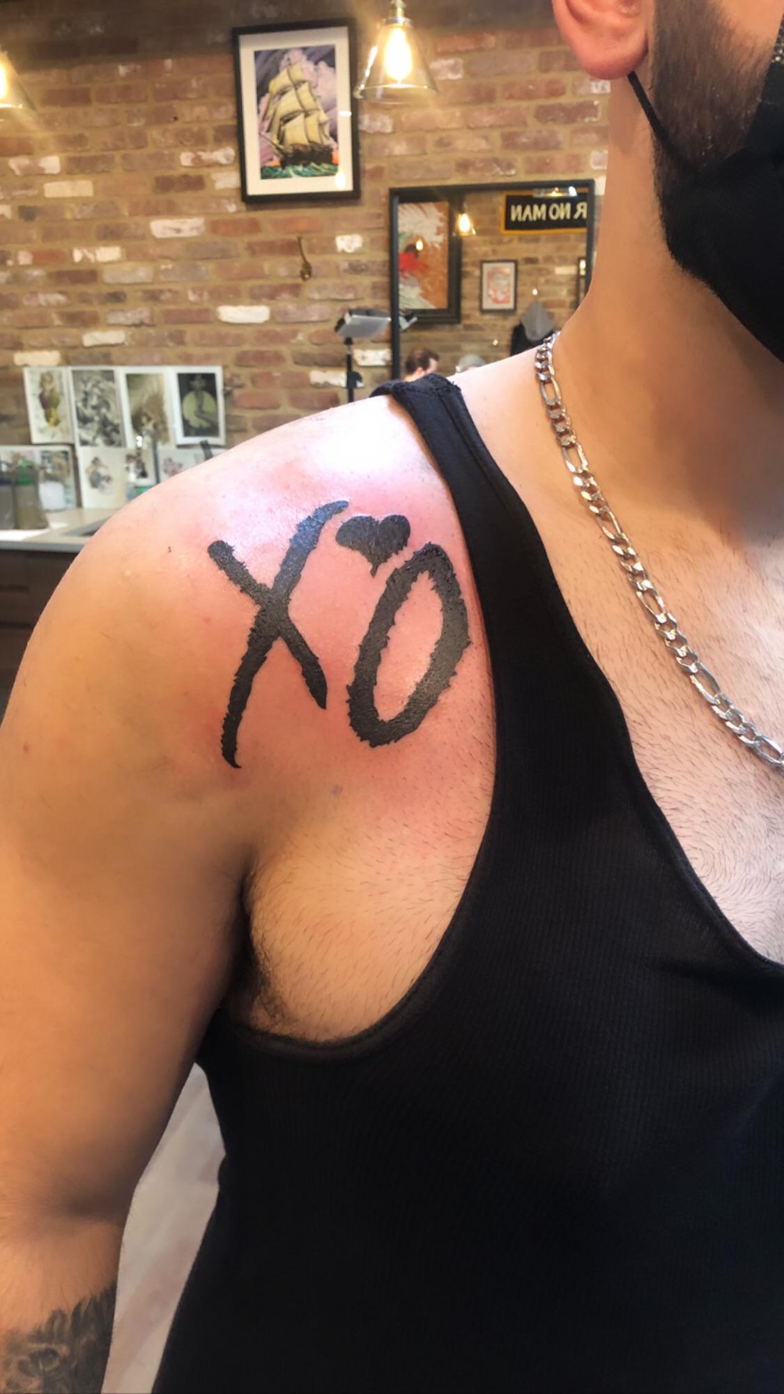 Bold Shoulder XO Tattoo Placement