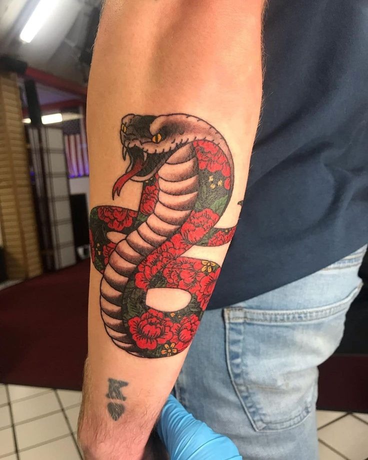 Detailed Cobra and Floral Tattoo