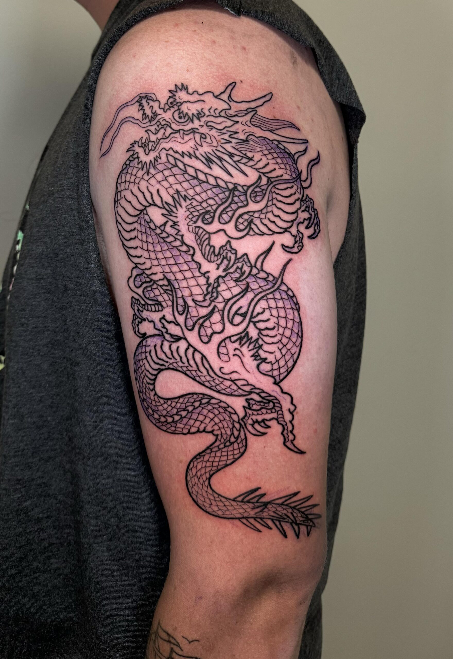 Classic Blackwork Dragon Arm Tattoo