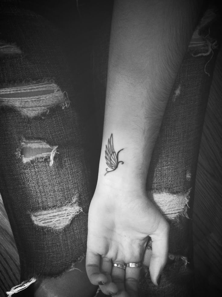Dainty Wrist Butterfly Tattoo