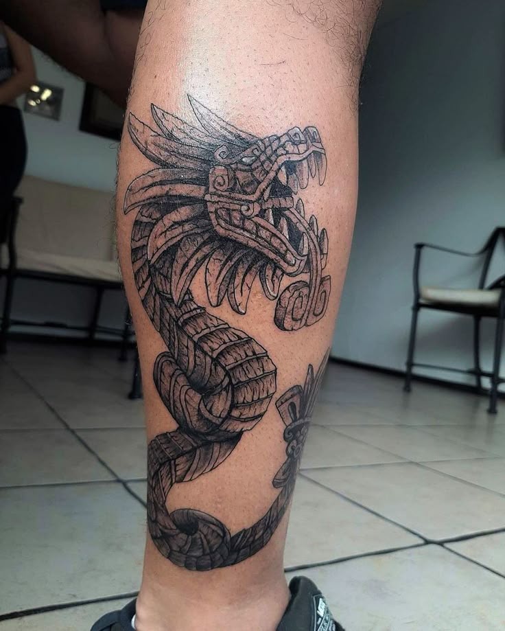 Detailed Quetzalcoatl Forearm Tattoo