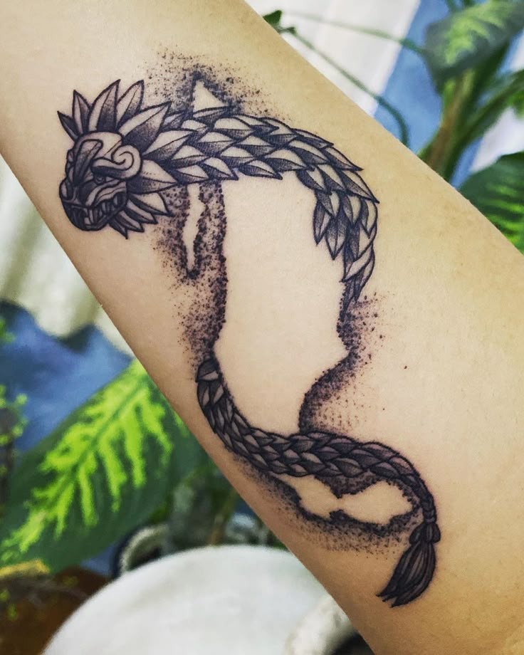 Dot-work Quetzalcoatl Arm Tattoo
