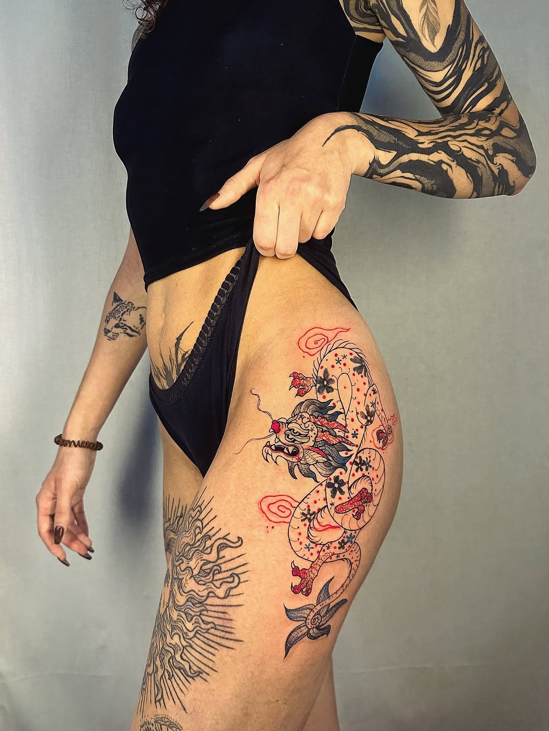 Elegant Minimalist Dragon Hip Tattoo