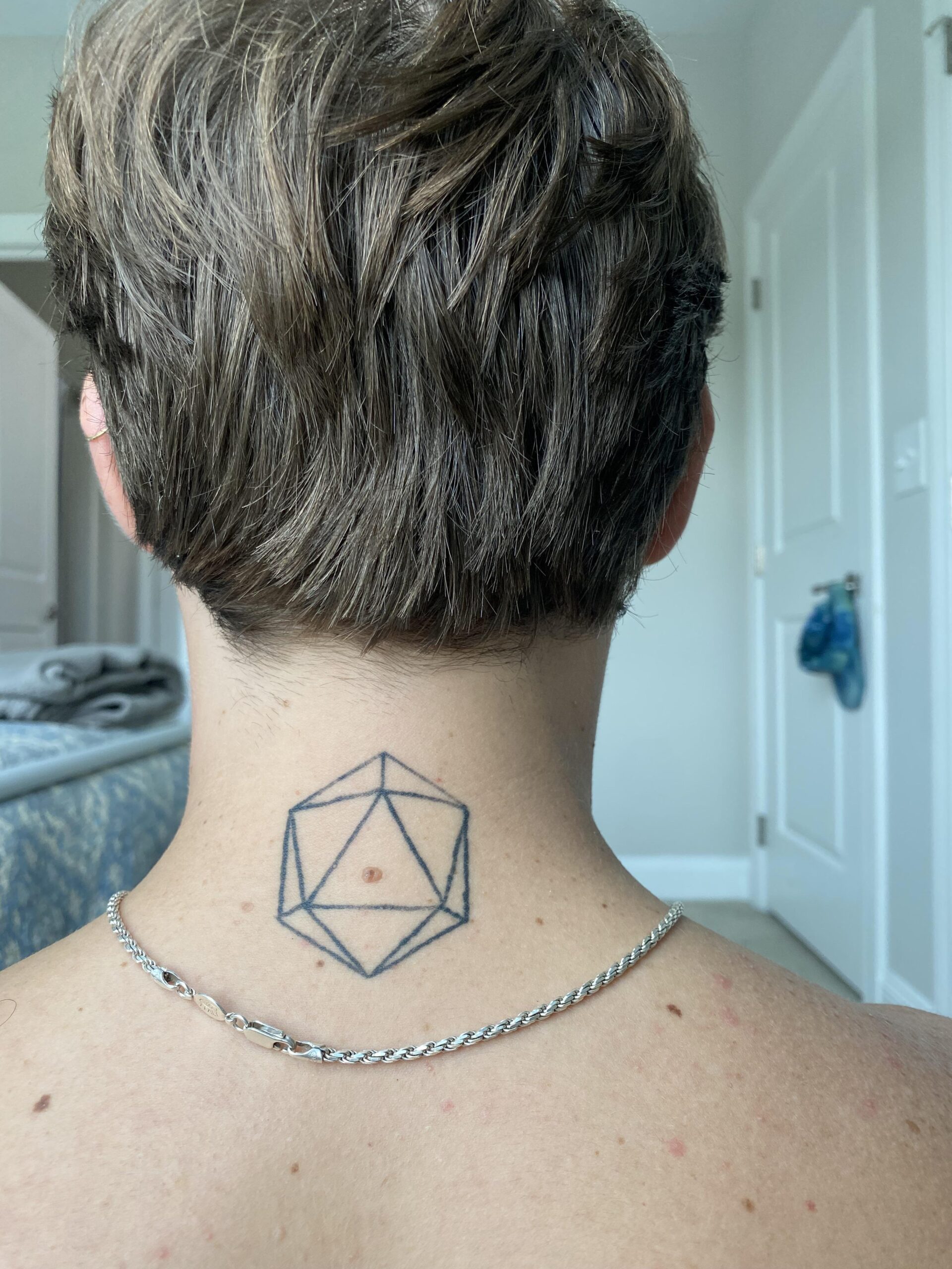 Minimalist Geometric Neck Tattoo