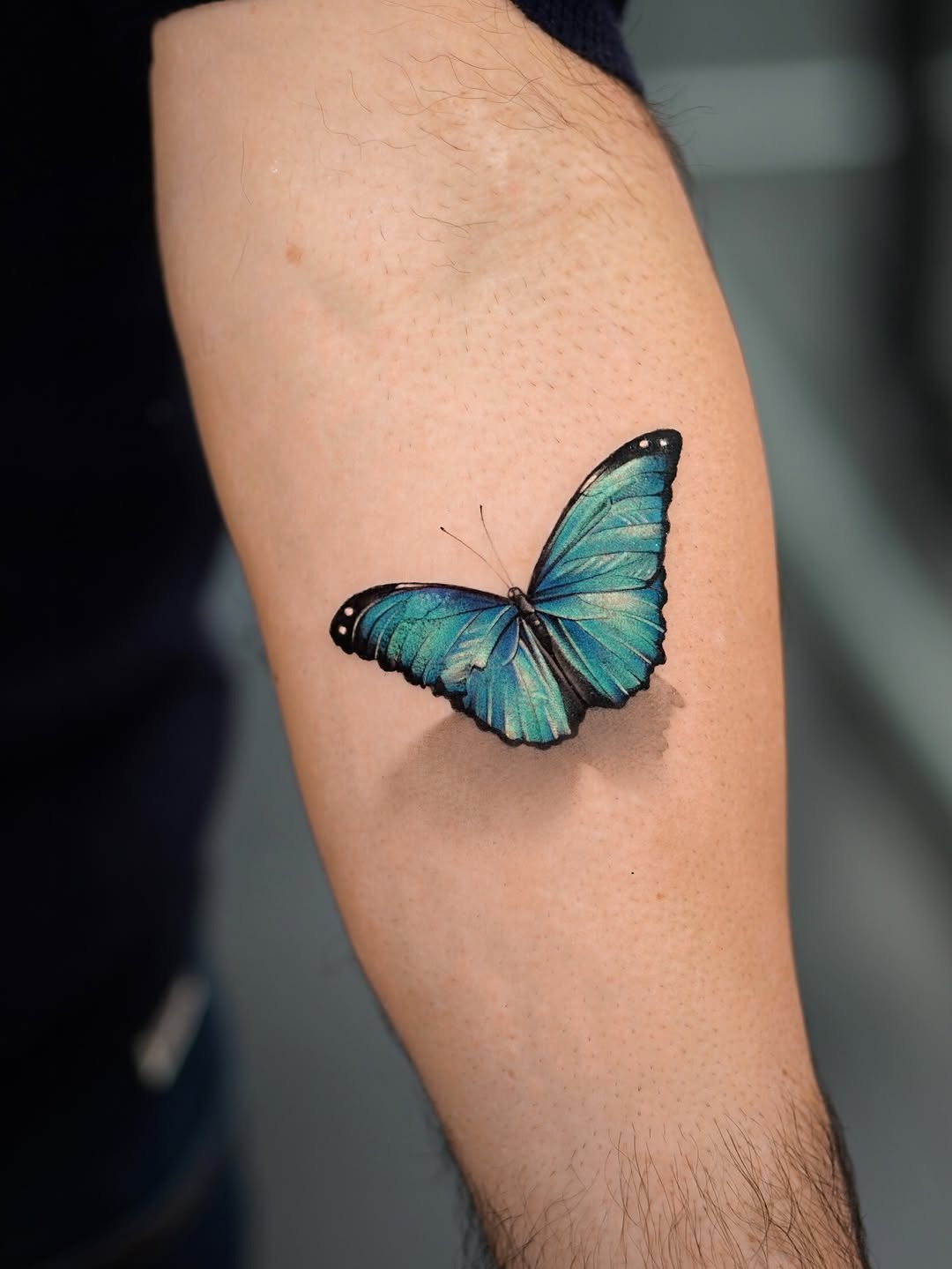 Stunning Realistic Blue Butterfly Tattoo