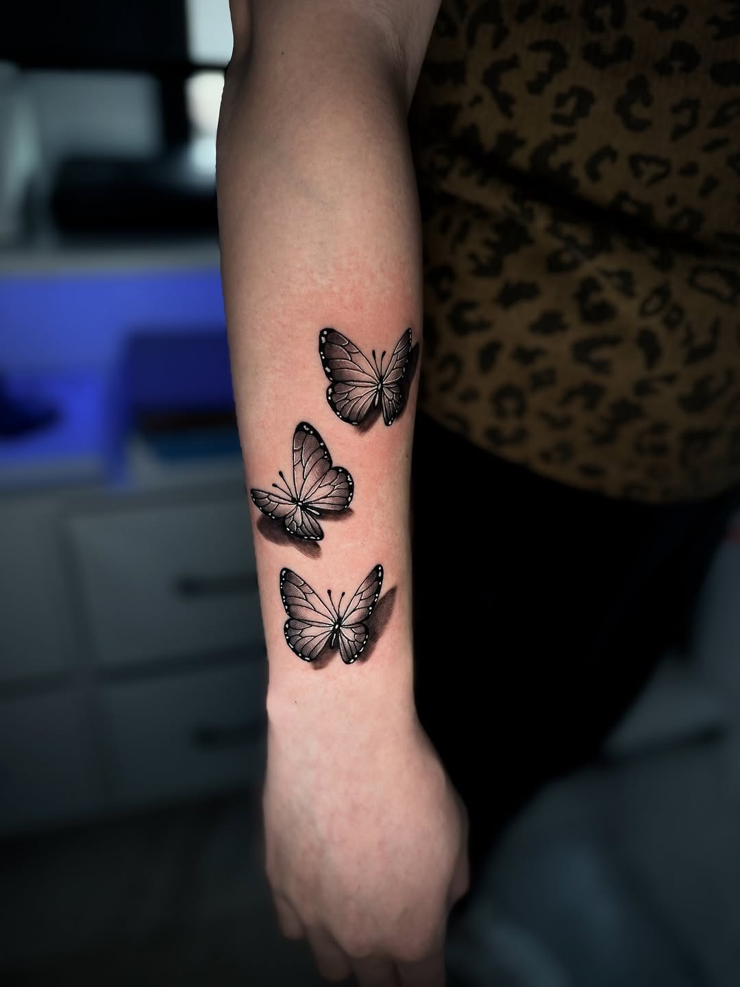 Elegant Trio of Butterfly Tattoos