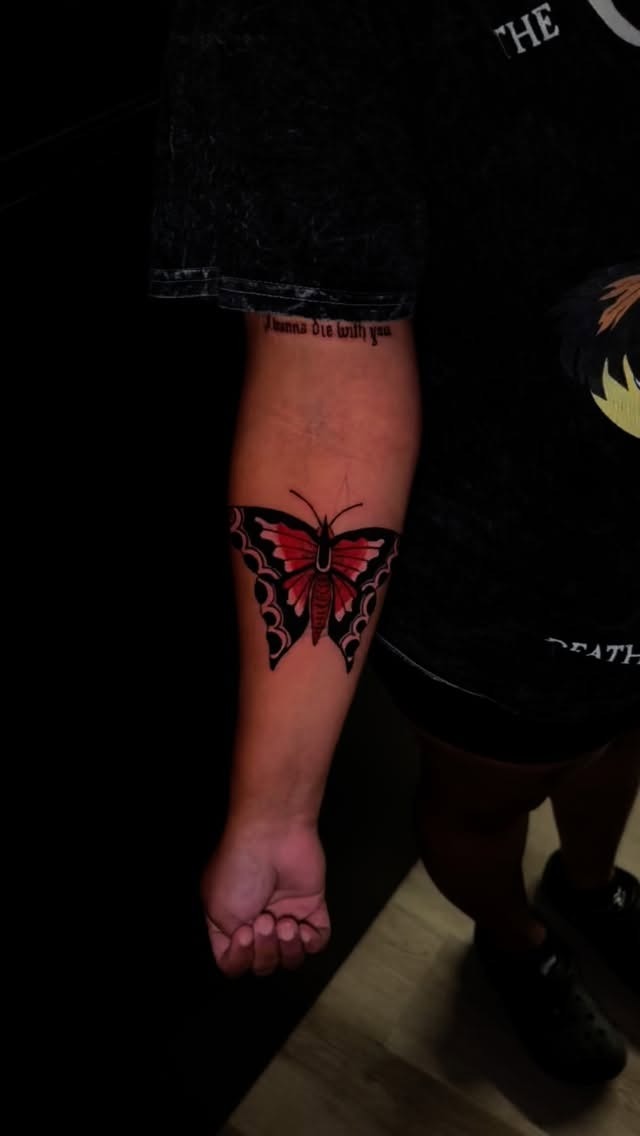 Bold Forearm Butterfly Design