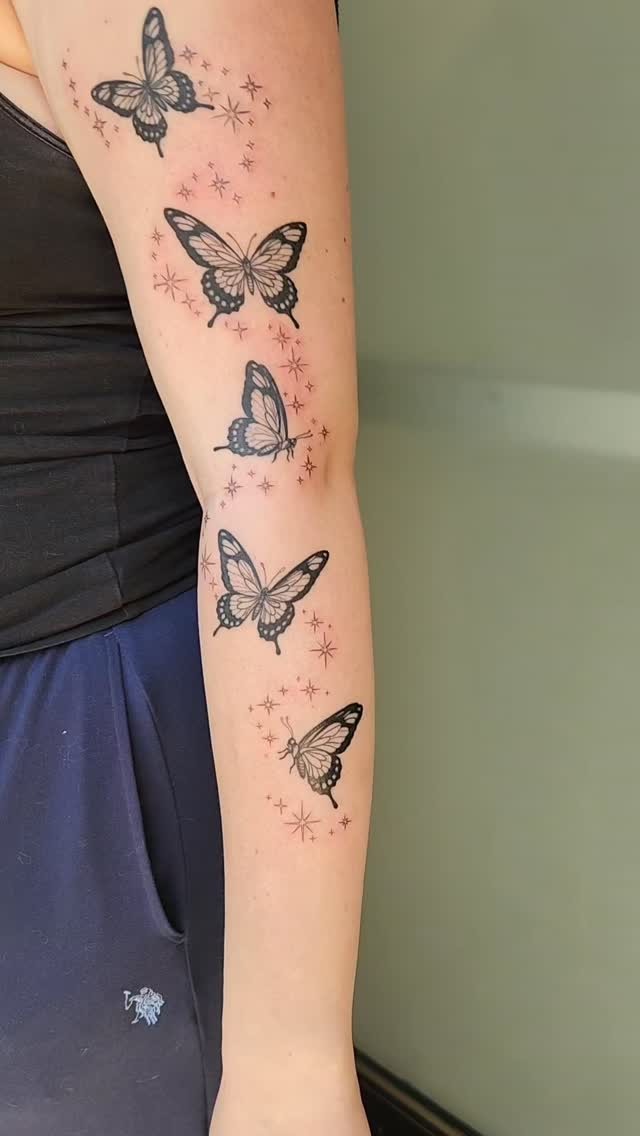 Delicate Flying Butterfly Arm Tattoo