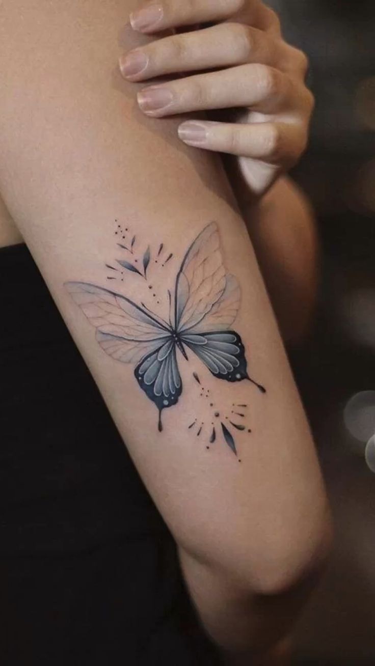 Elegant Soft-Shaded Butterfly Arm Tattoo
