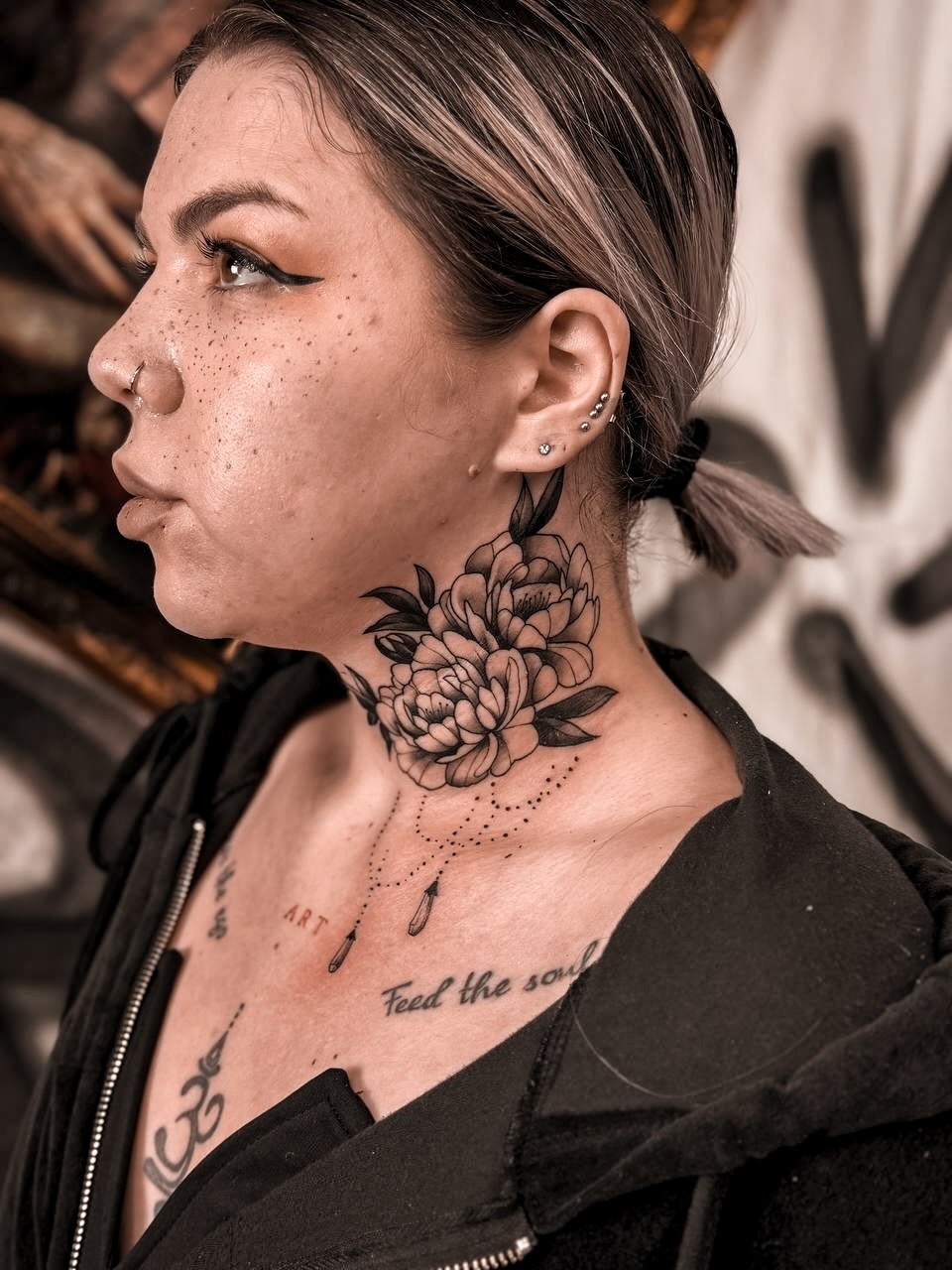 Elegant Black and Grey Floral Throat Tattoo