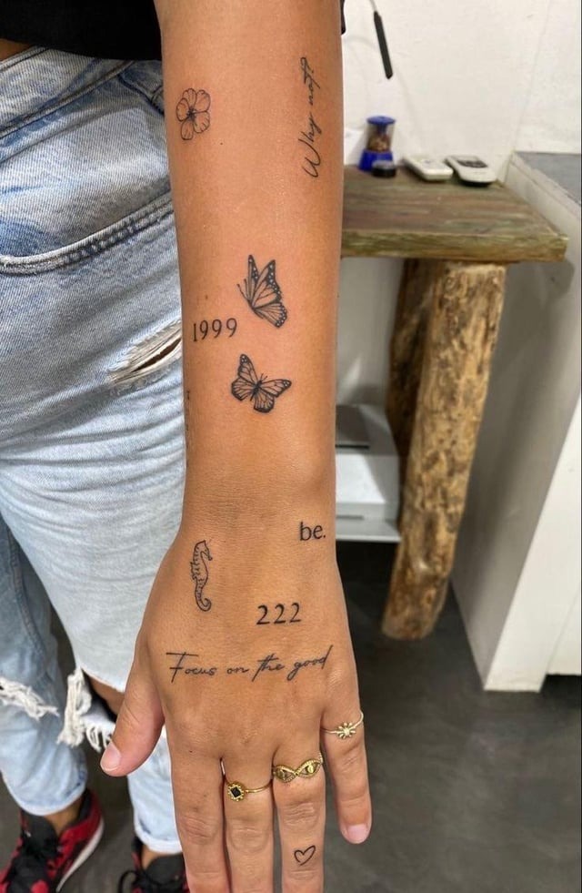 Minimalist Butterfly Icon Finger and Arm Tattoos