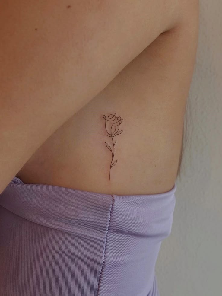 Graceful Fine Line Rose Tattoo