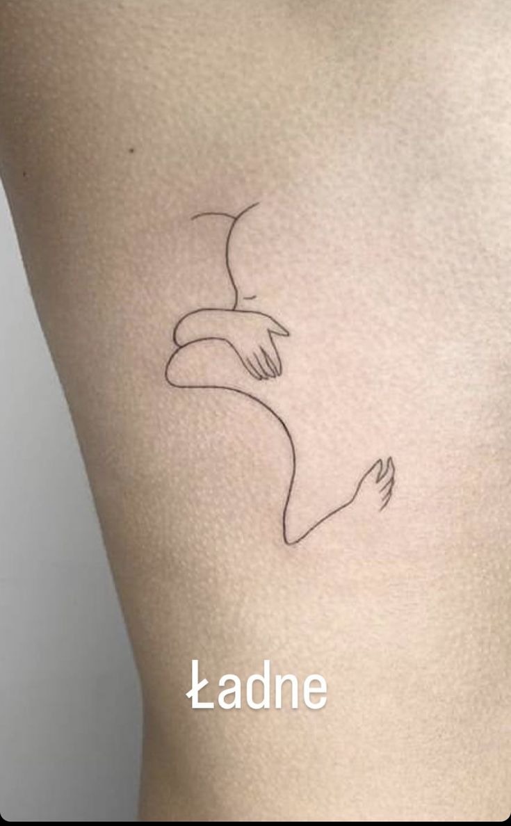 Delicate Minimalist Line Art Tattoo