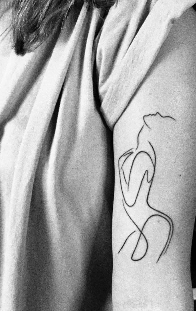 Artistic Minimalist Body Outline Tattoo