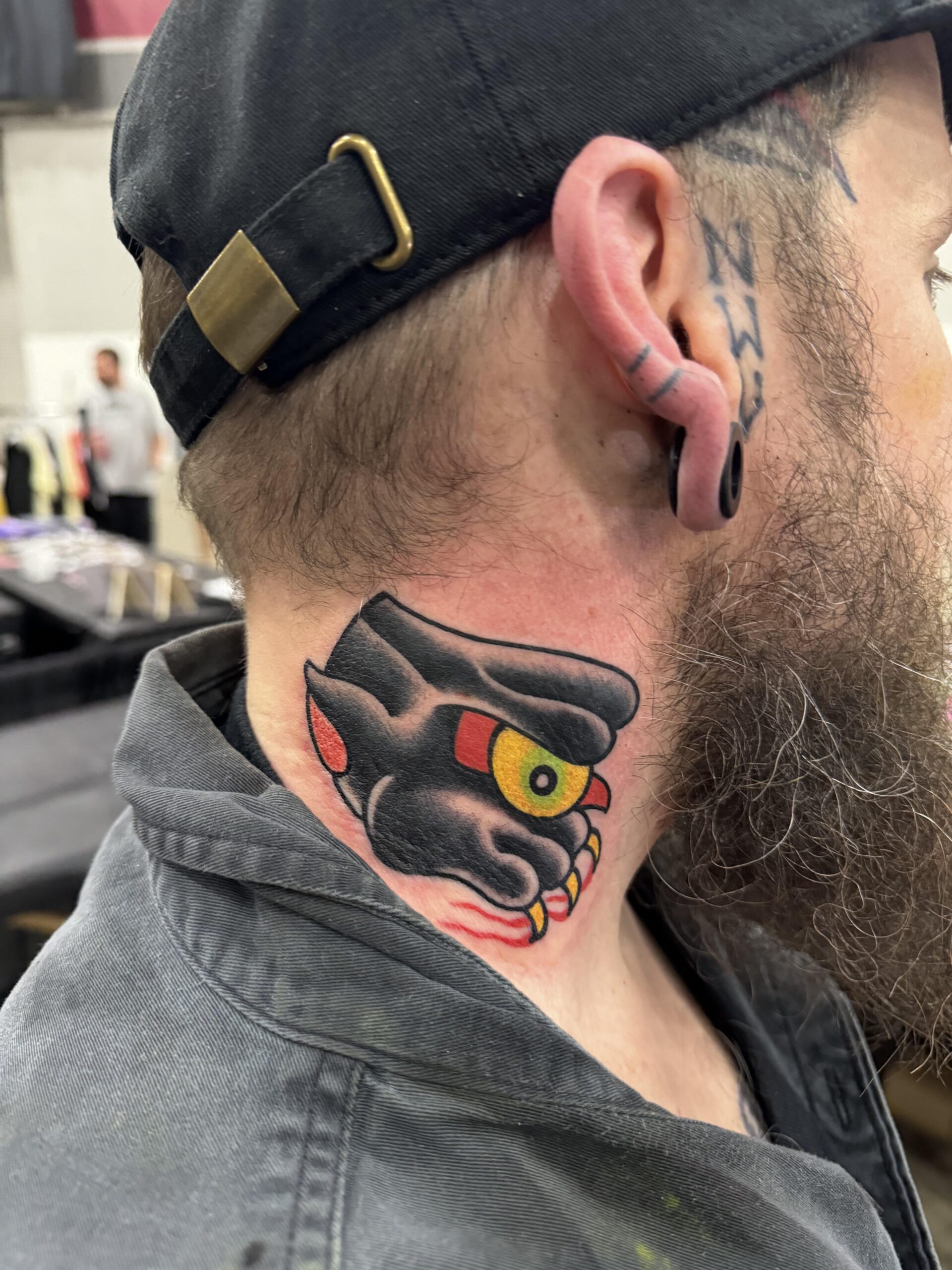 Bold traditional panther neck tattoo design
