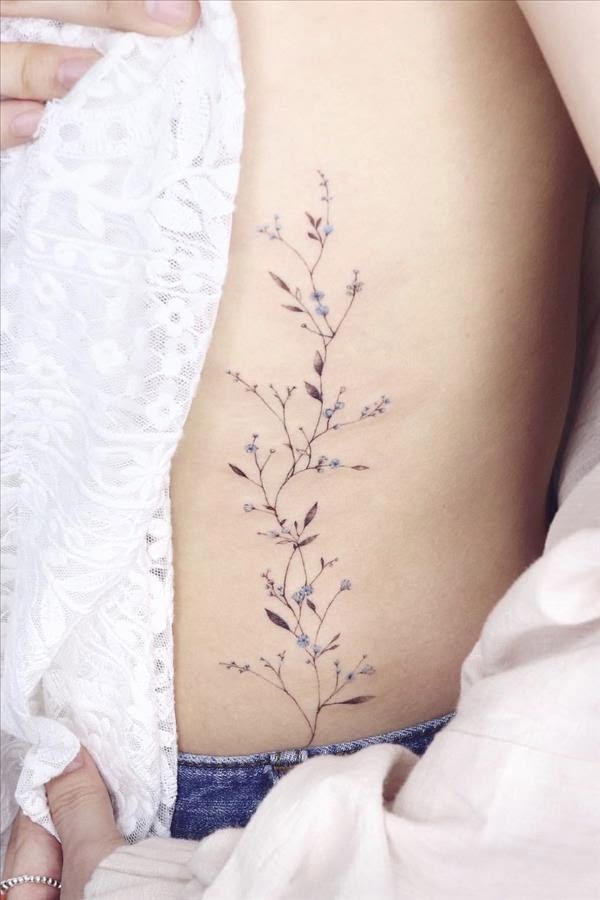 Dainty Floral Spine & Rib Tattoo