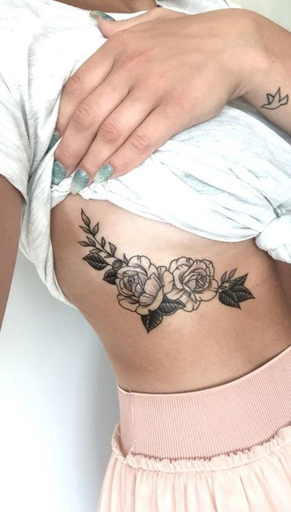 Bold Rose Ribcage Tattoo