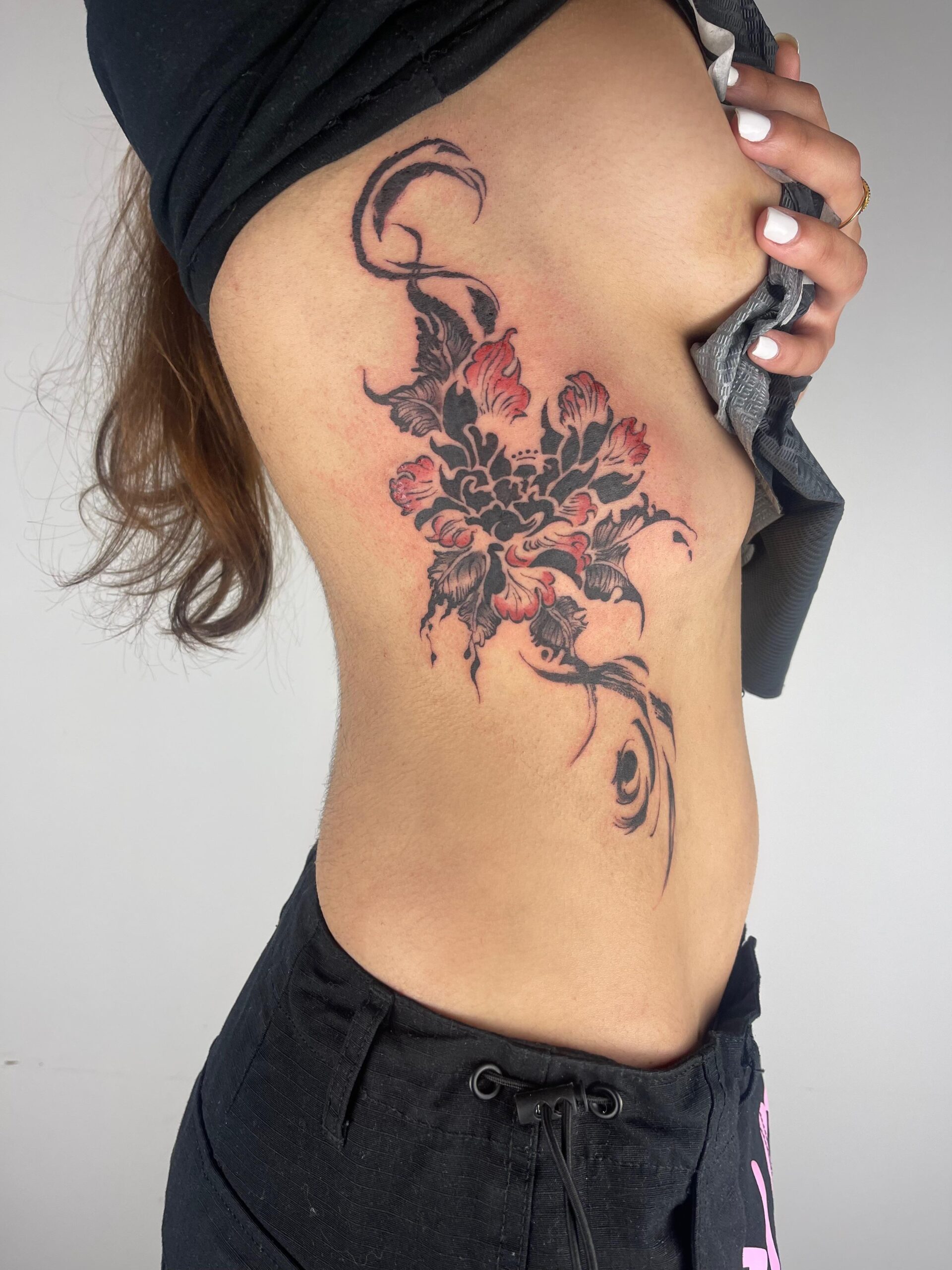 Intricate Red and Black Ribcage Piece
