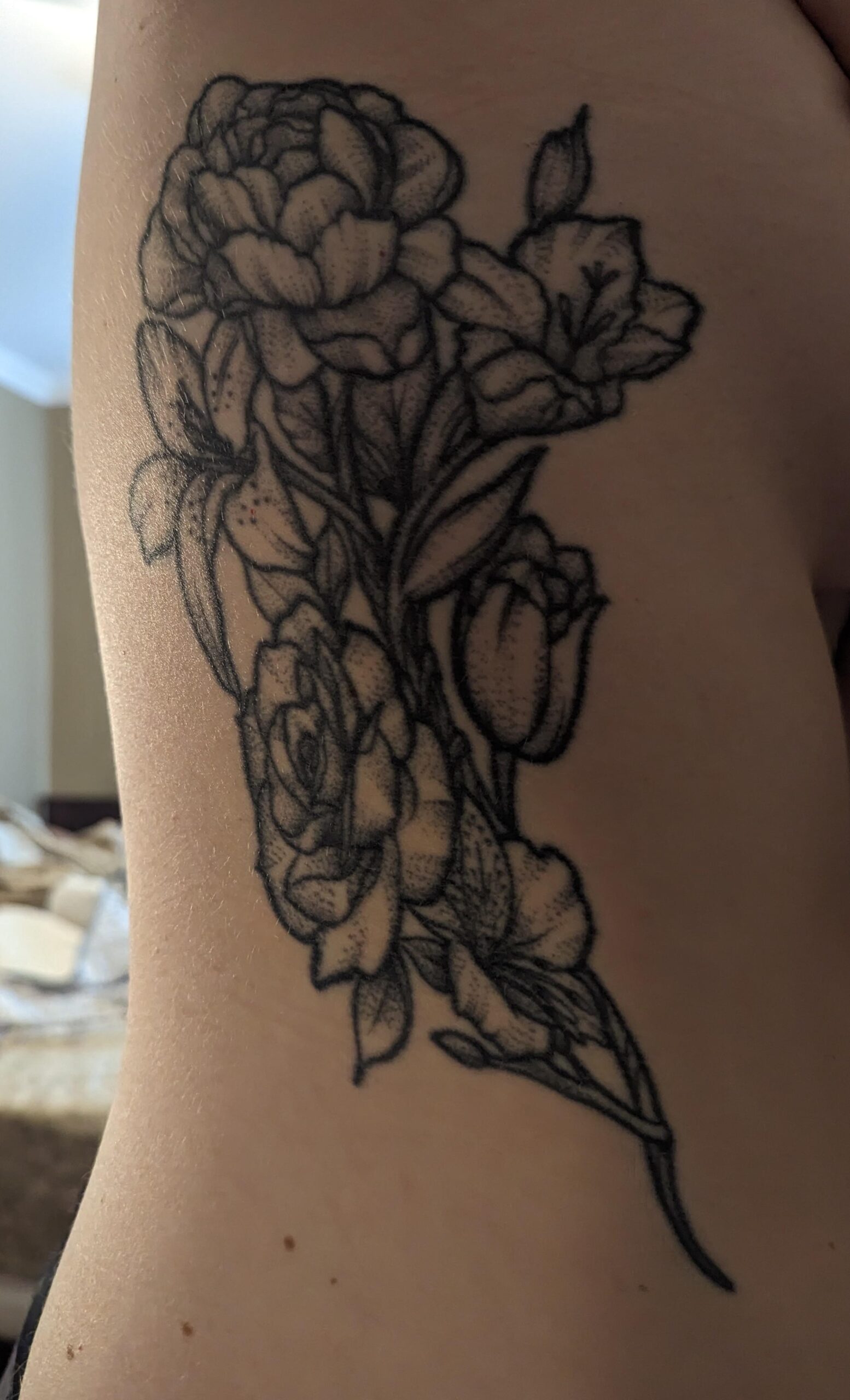 Bold Bouquet Ribcage Tattoo