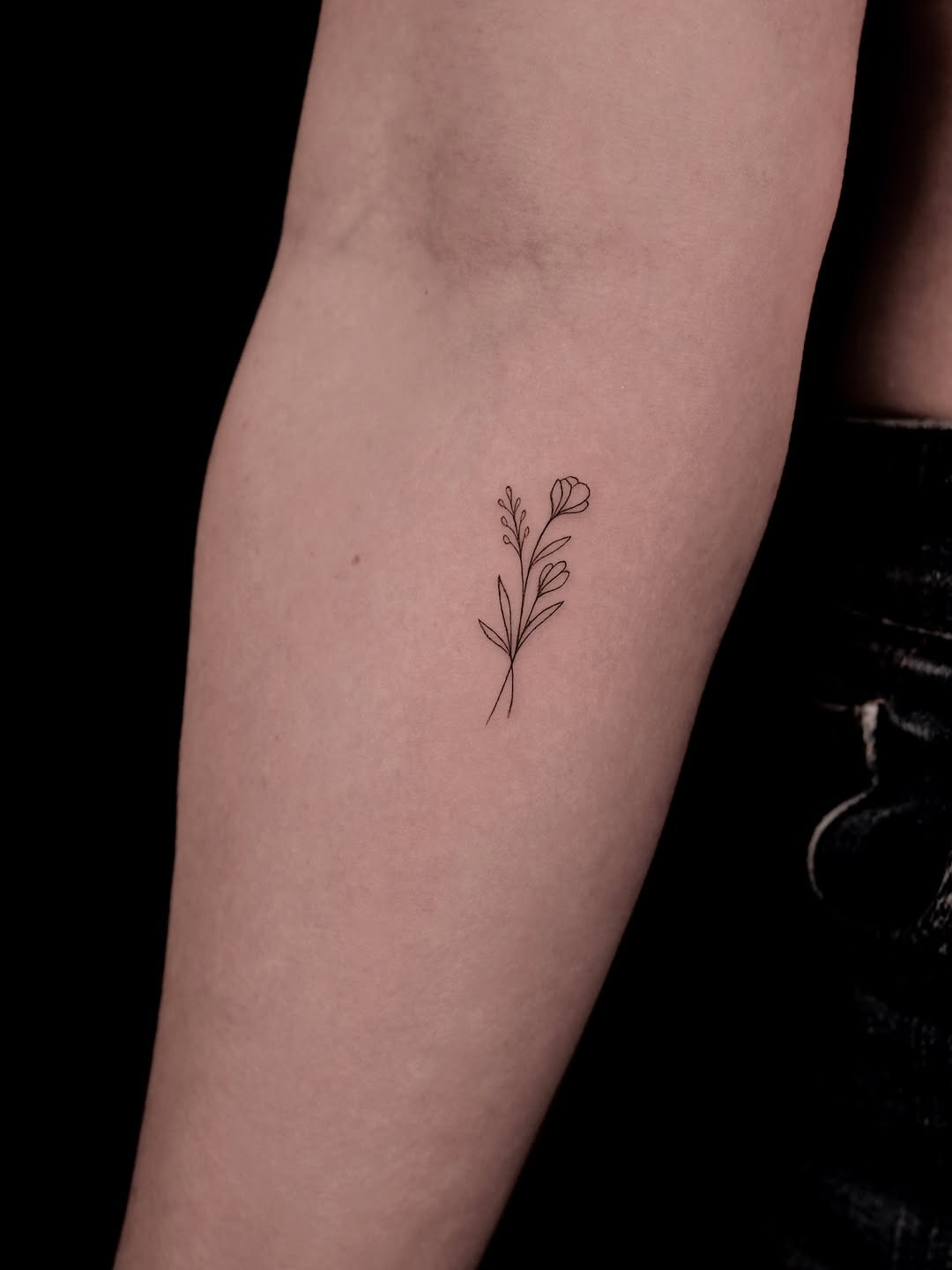 Delicate Single-Flower Minimalist Tattoo