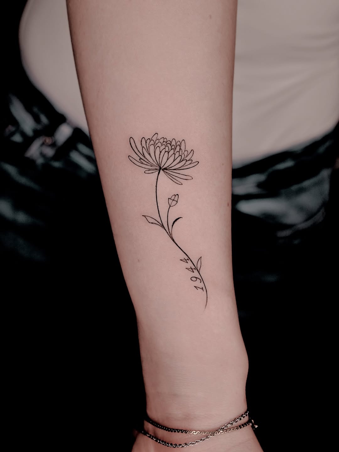 Delicate Fine-Line Floral Tattoo
