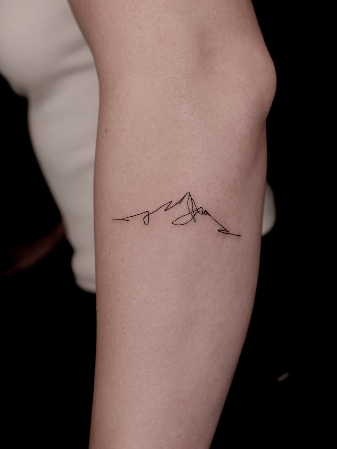 Simple Mountain Range Line Tattoo