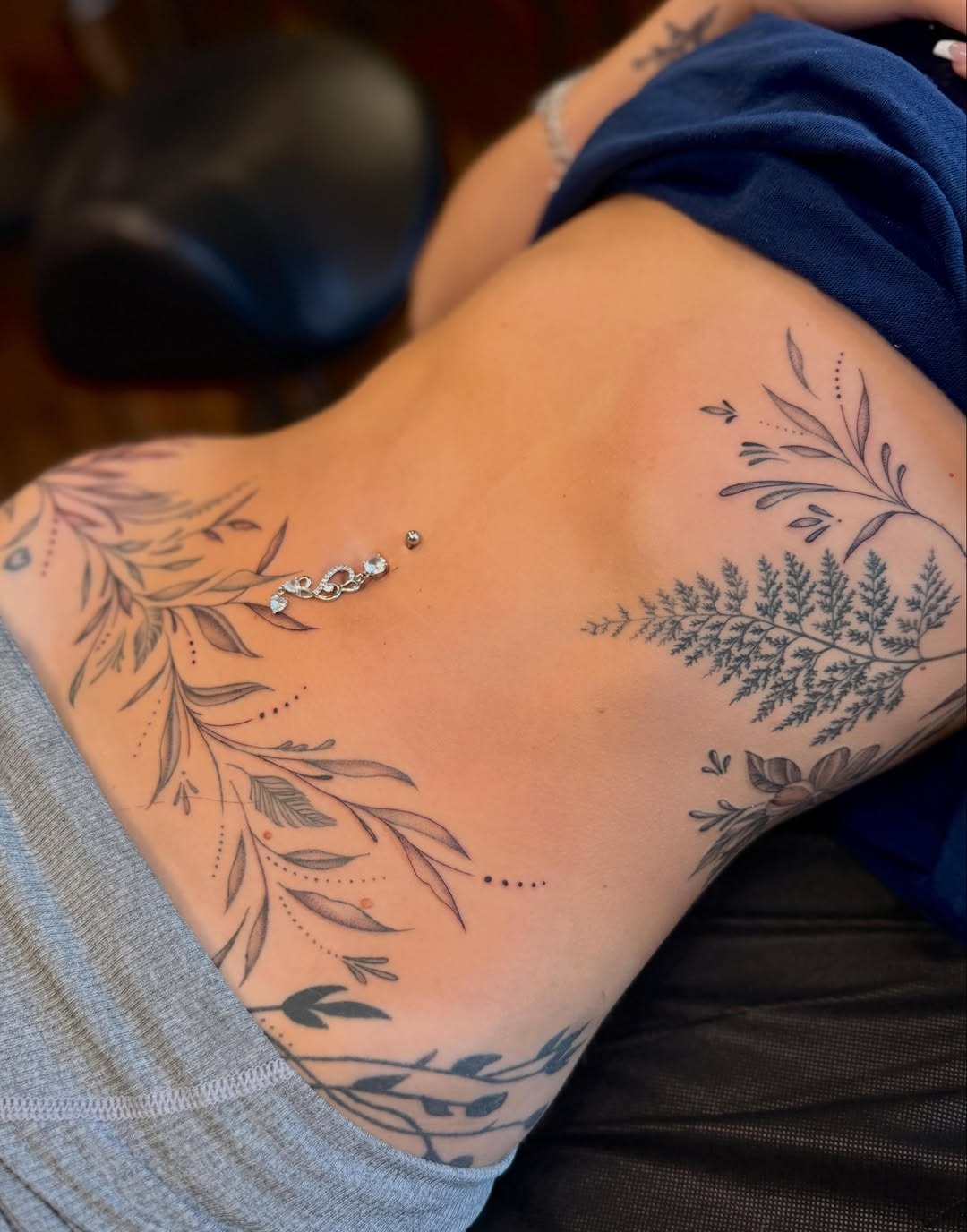 Elegant Botanical Side Tattoos