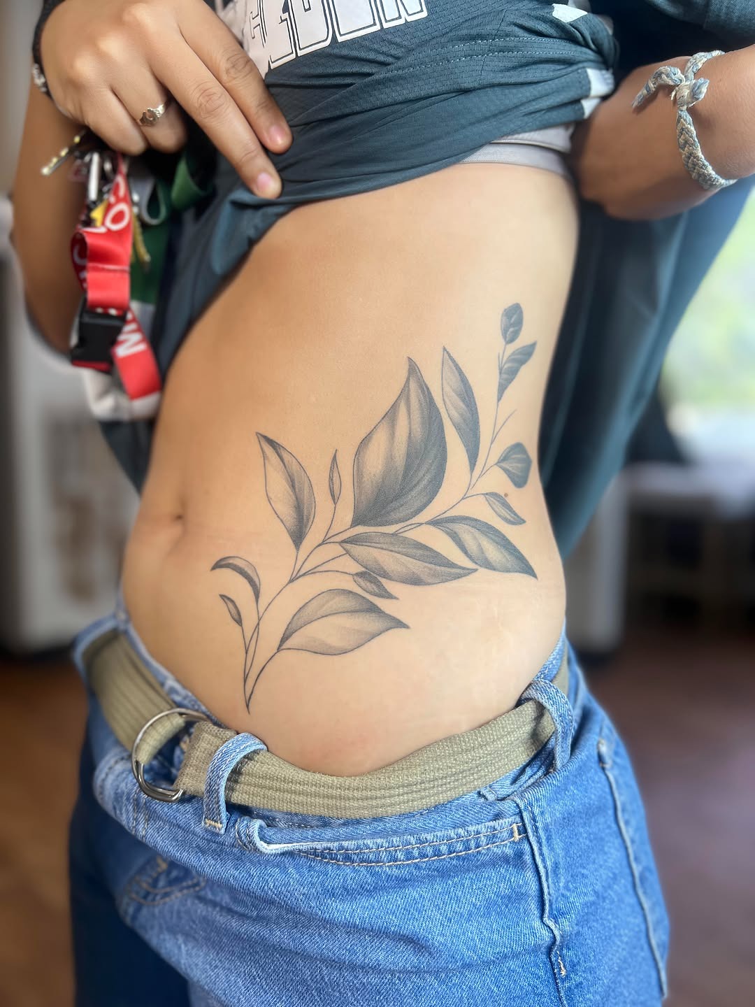 Modern Minimalist Leafy Rib Tattoo