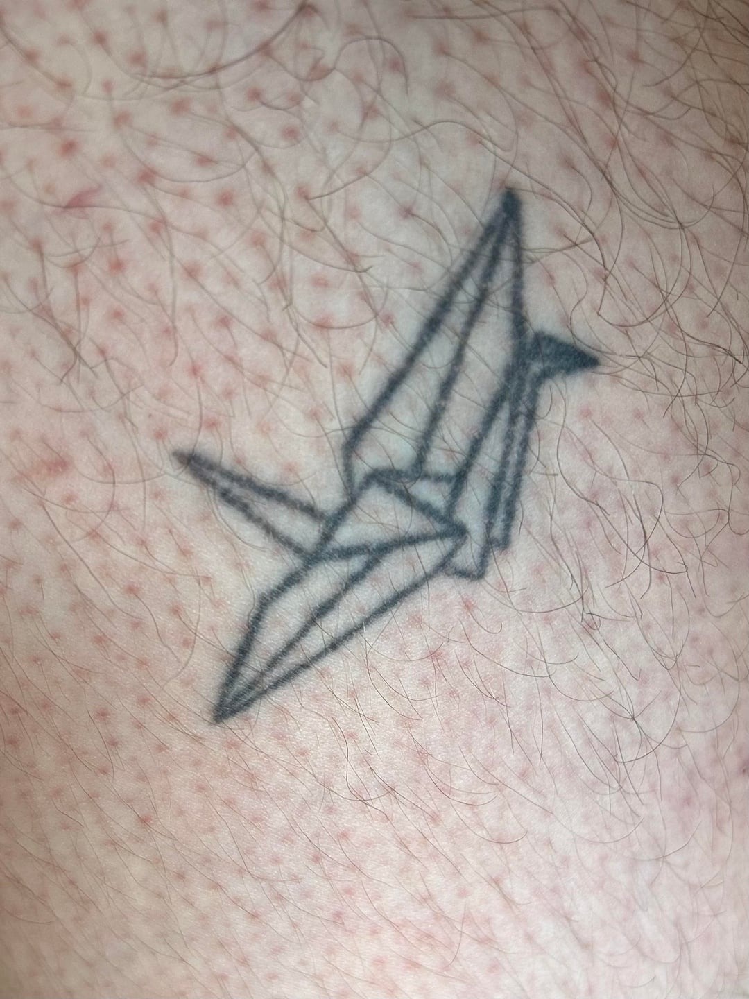 Simple Paper Crane Finger Tattoo