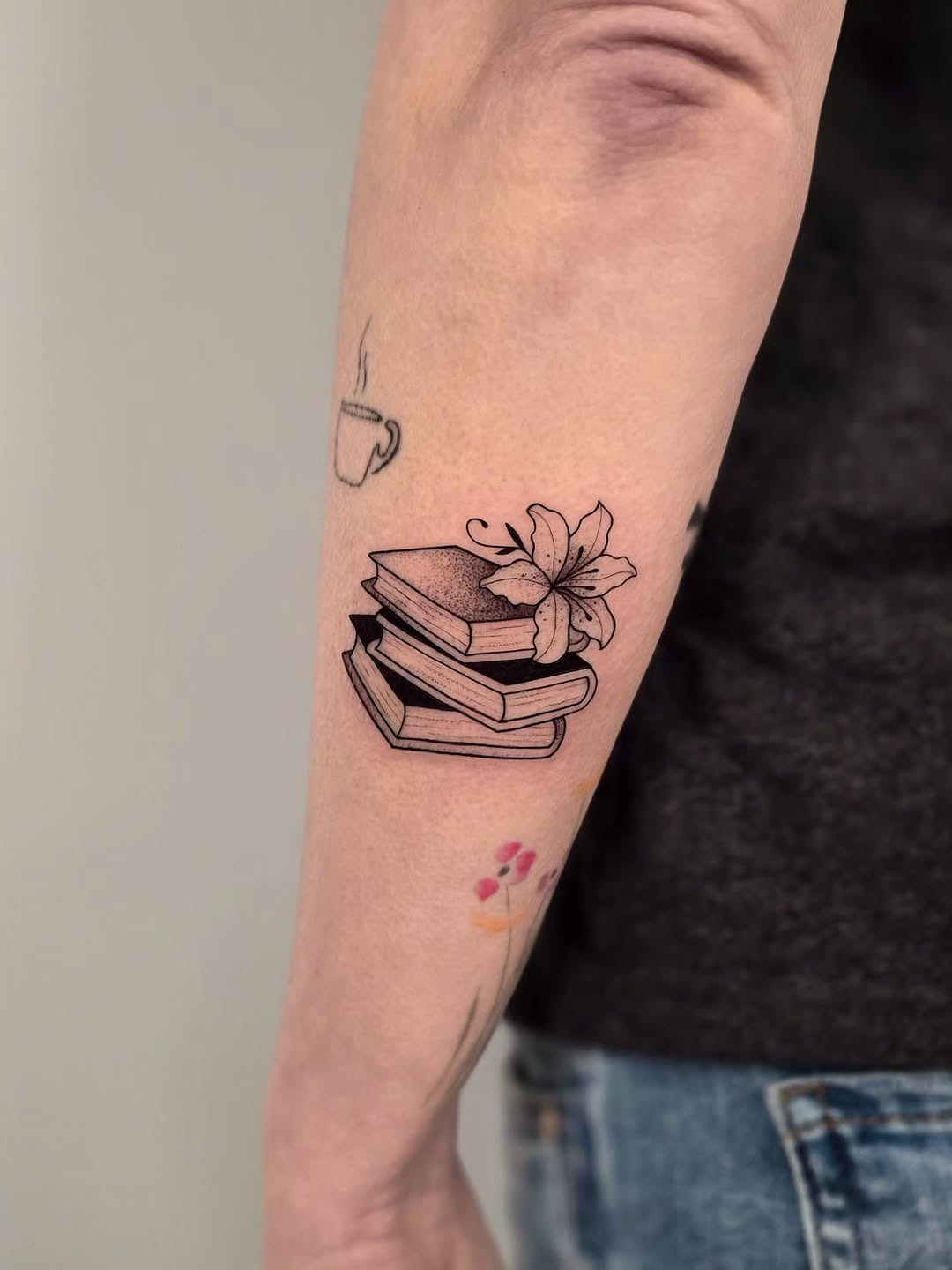 Stack of Books With Floral Ornament